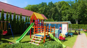AIDA Domki Letniskowe - Plac Zabaw & ANIMACJE dla DZIECI, Rewal